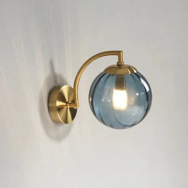 Gold Wall Sconce with Ribbed Glass Globe