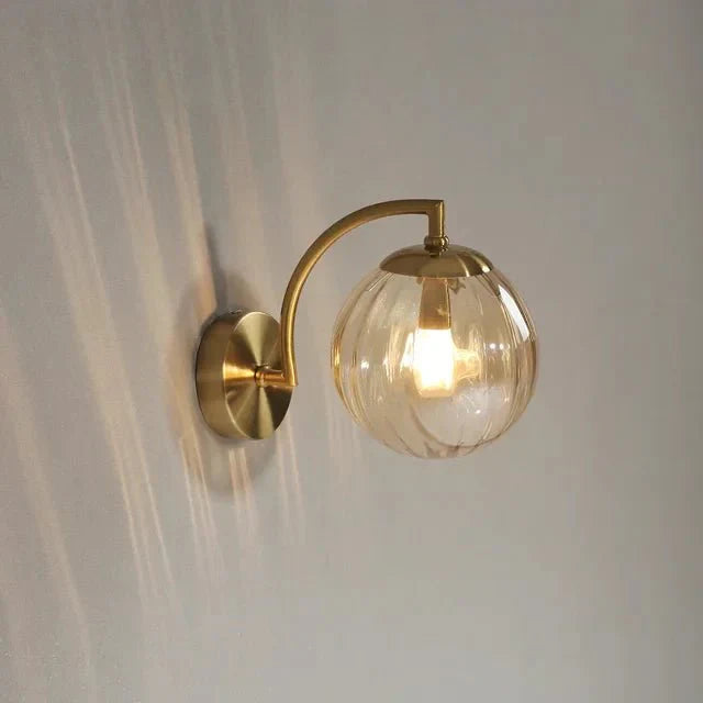 Gold Wall Sconce with Ribbed Glass Globe