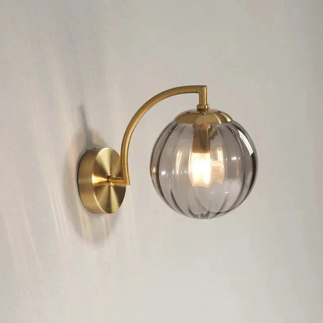 Gold Wall Sconce with Ribbed Glass Globe