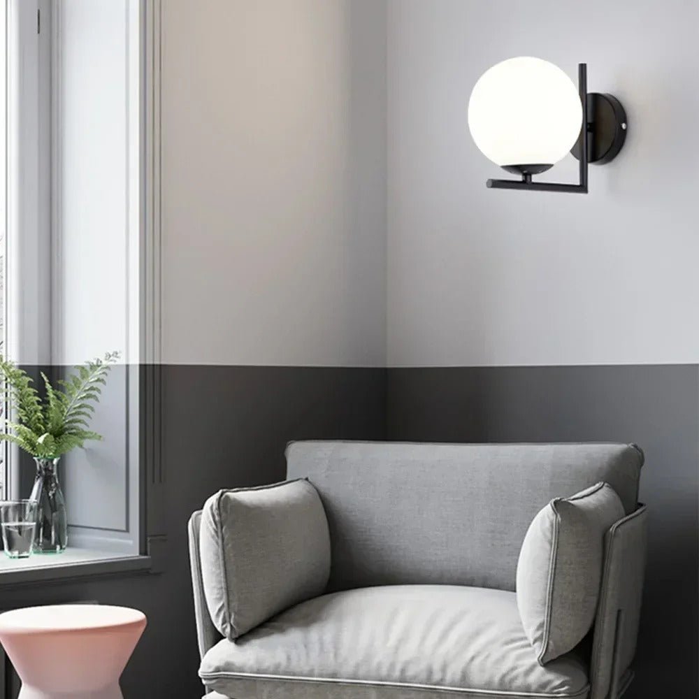 Glass Orb Wall Sconce with Metal Frame