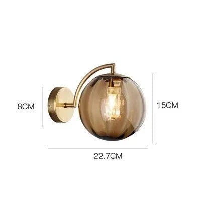 Gold Wall Sconce with Ribbed Glass Globe