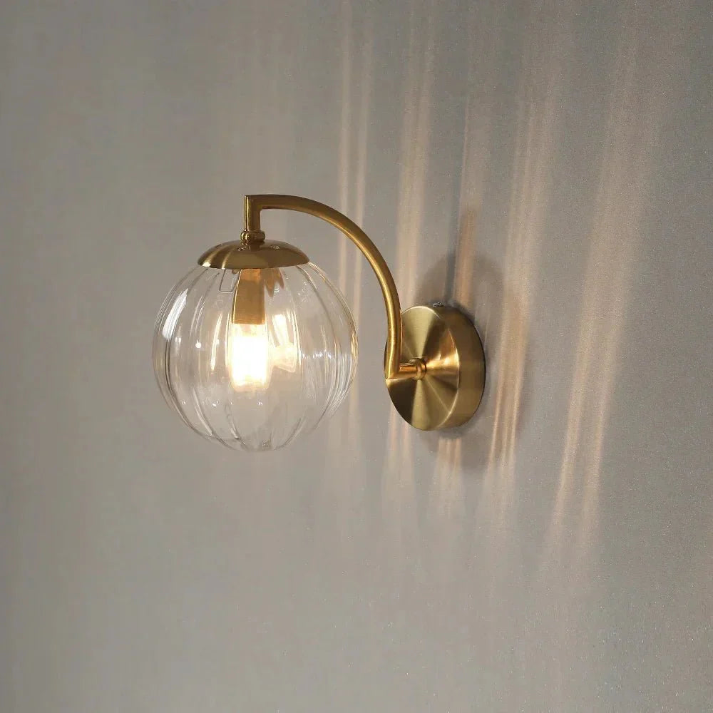 Gold Wall Sconce with Ribbed Glass Globe